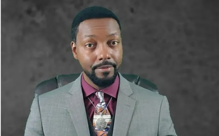 Billy Carson speaking at a consciousness conference in front of a crowd