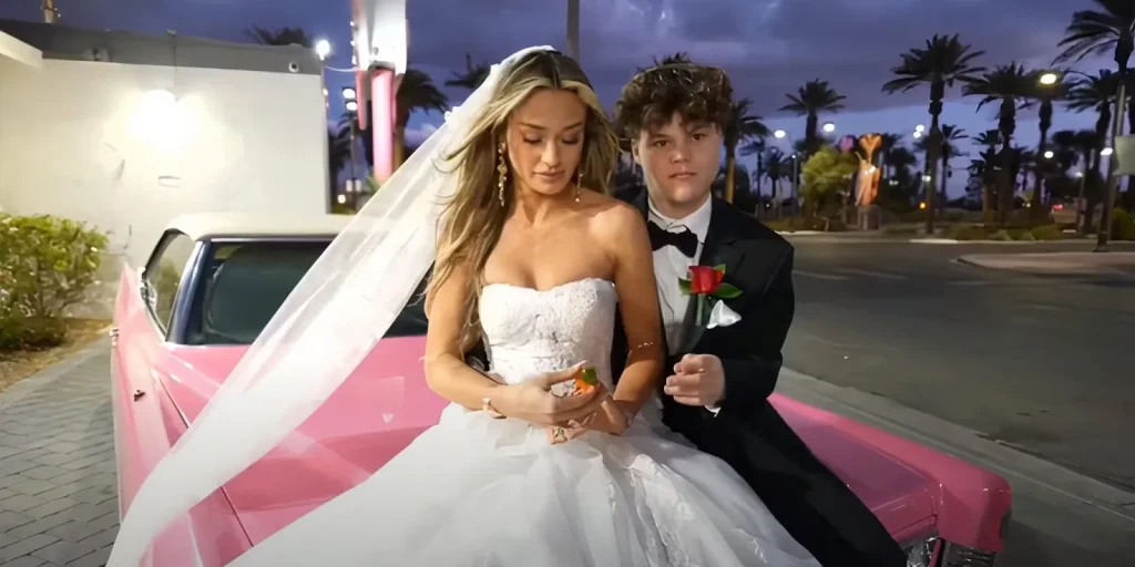 Jack Doherty standing in front of luxury cars and mansion, symbolizing his millionaire lifestyle and influencer success in 2025.