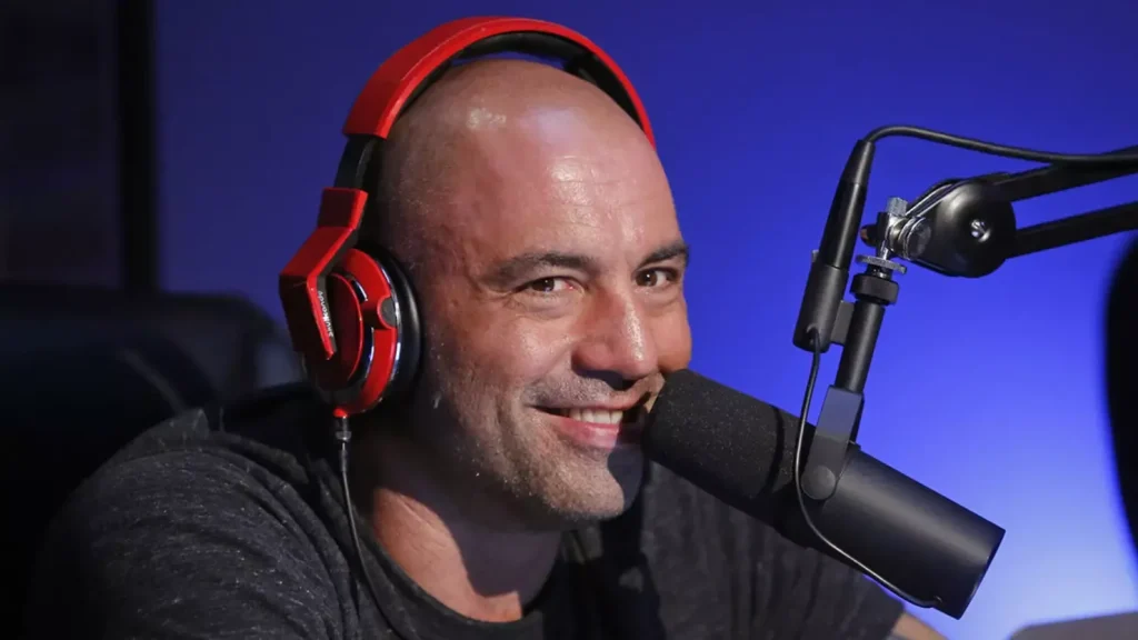 Joe Rogan speaking during a podcast episode, reflecting his role as a top media personality and podcast host